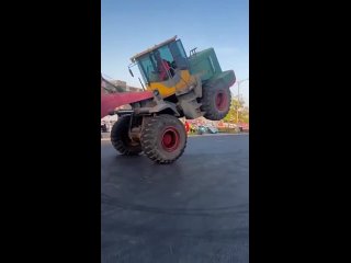 this loader driver masterfully controls the technique, as if merging with it.
